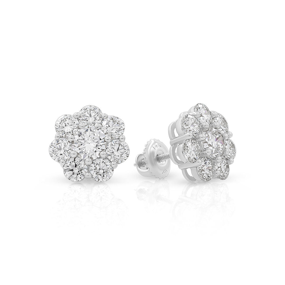A pair of diamond stud earrings with a floral design.