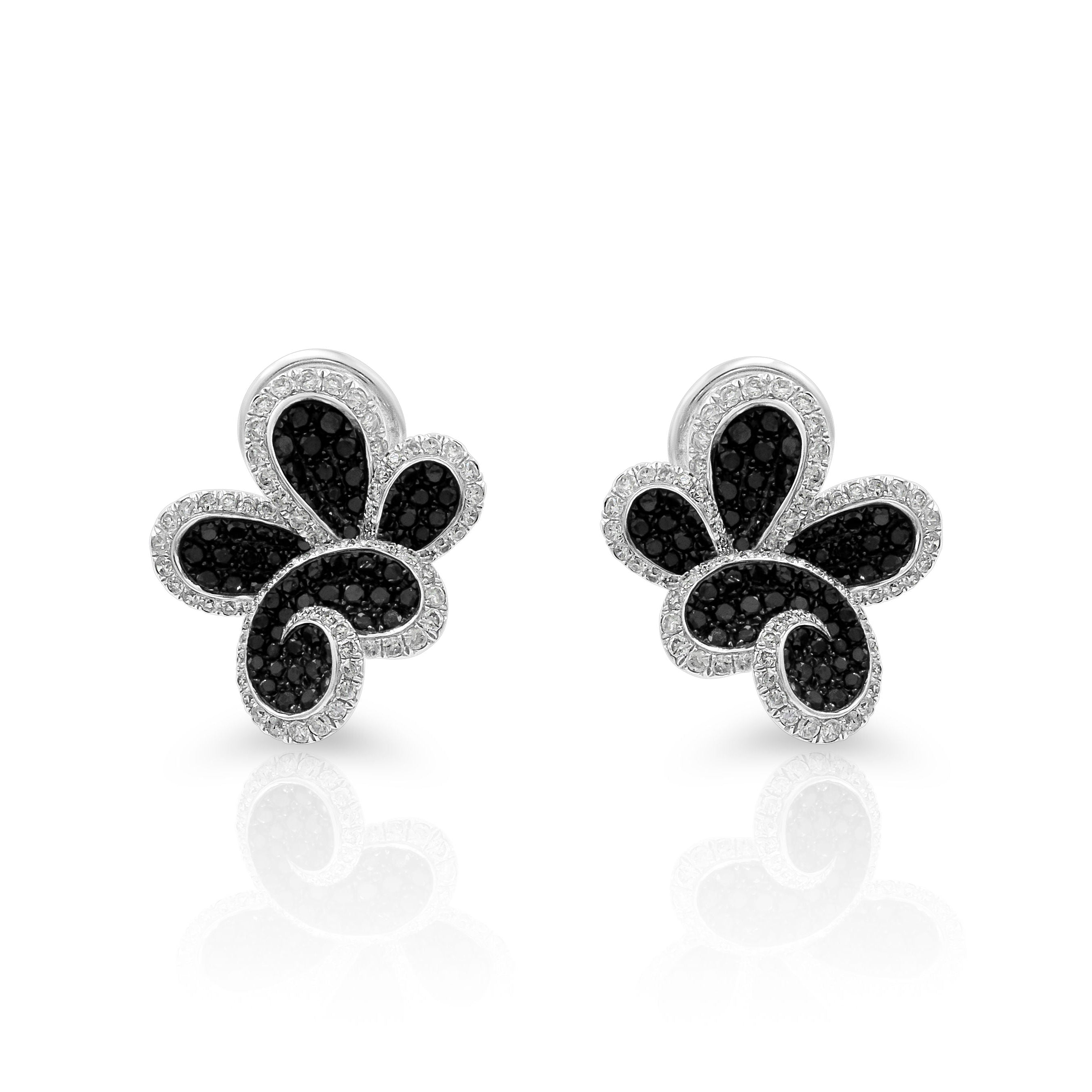 A pair of 18kt floral butterfly black and white diamond earrings against a white background.