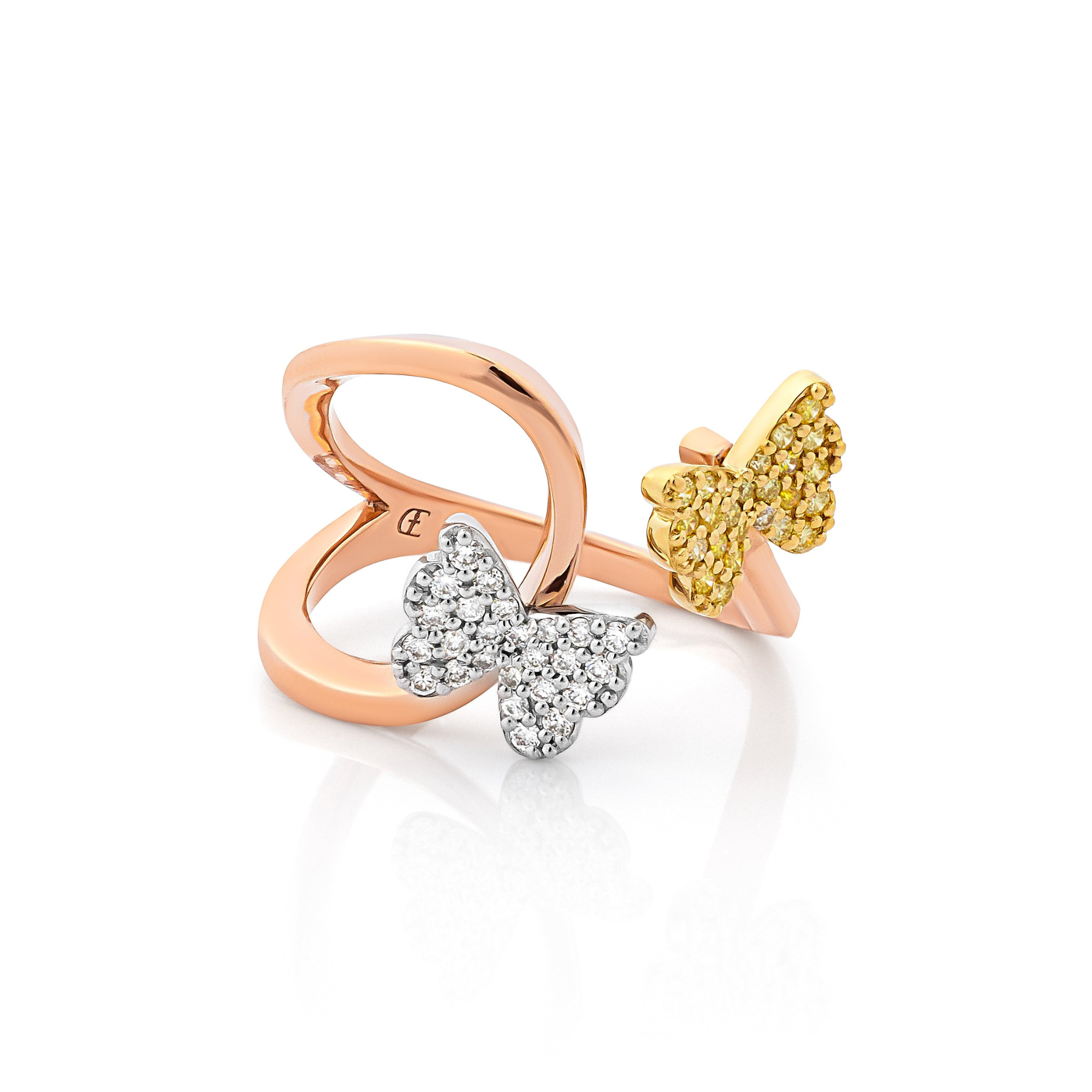 A tricolor butterfly ring with yellow, white, and rose gold colors, featuring diamond-quality gemstones.