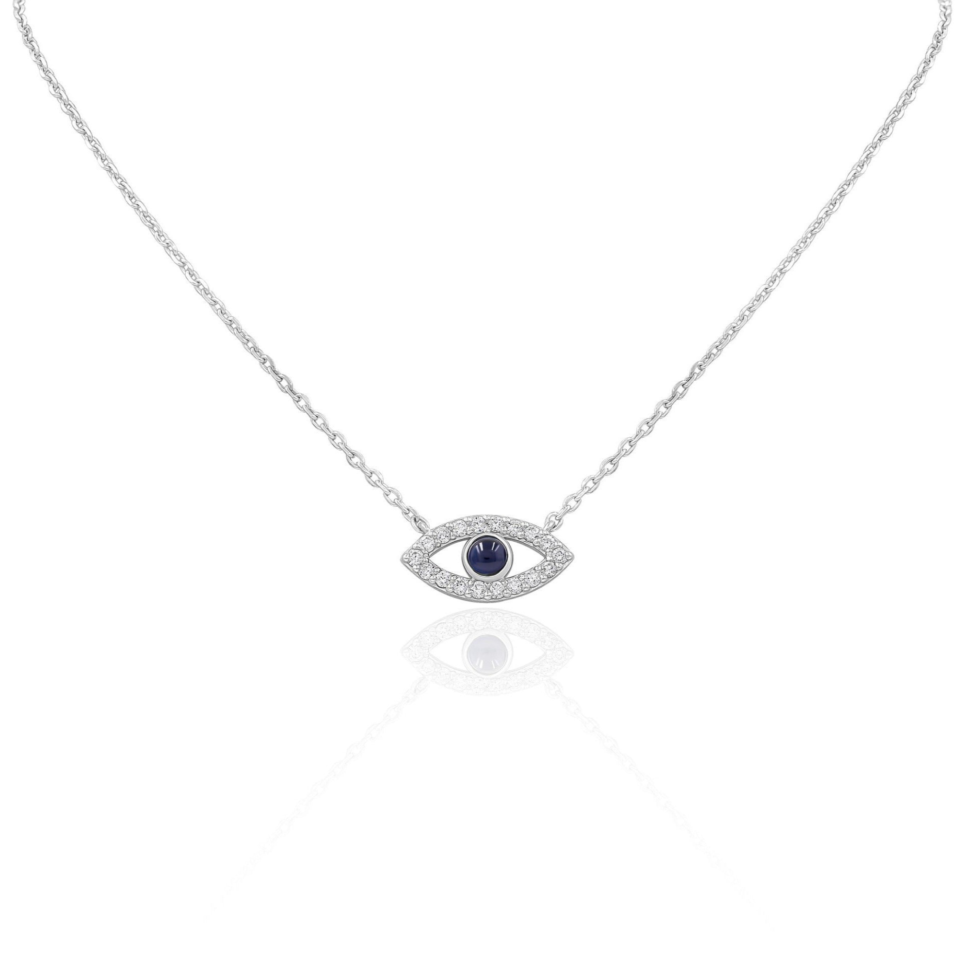 A white gold necklace with a single blue and white gemstone pendant designed to resemble evil eye.