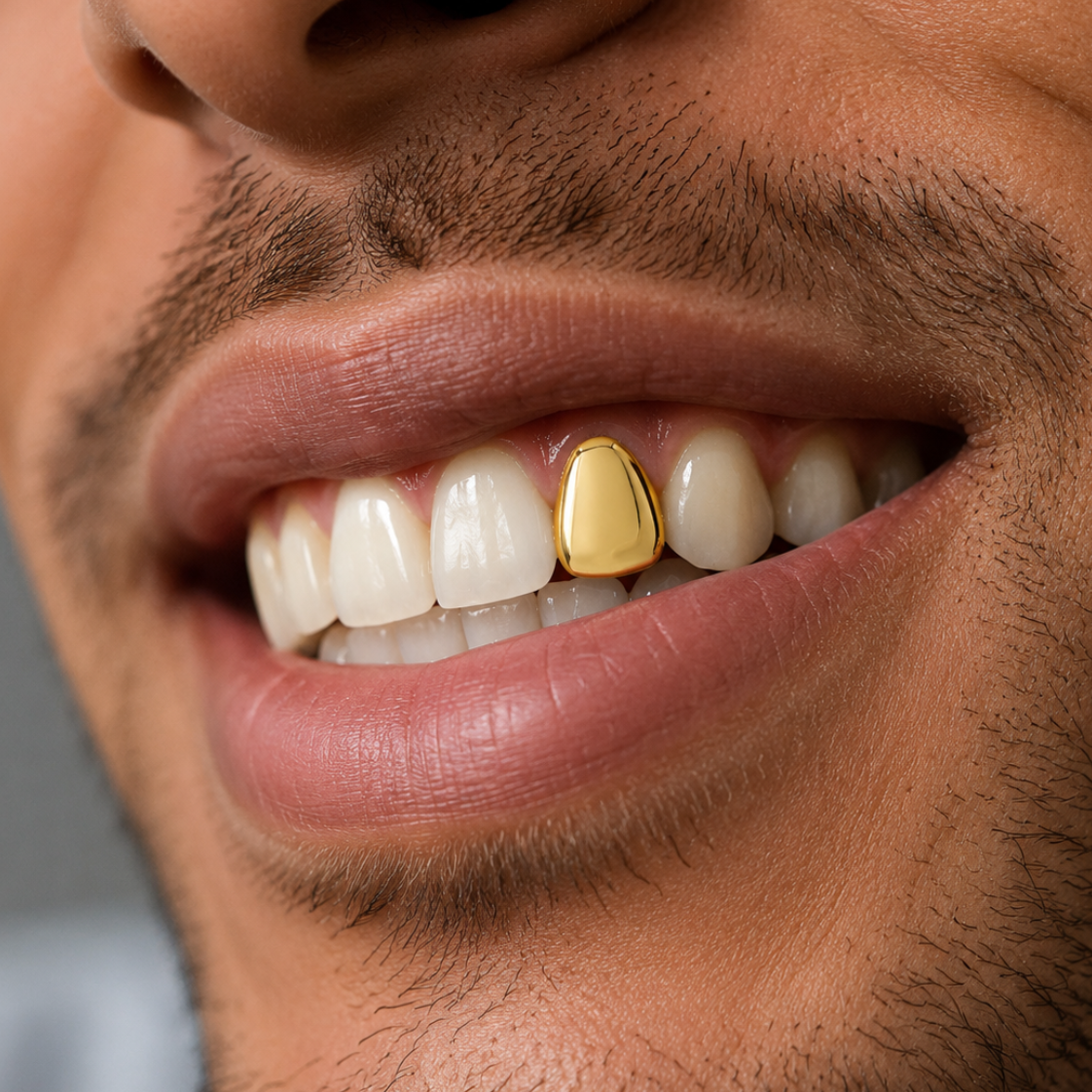 classic solid gold grillz

solid gold tooth grill

custom gold grillz

gold grillz front view

gold tooth cap

custom-fit gold grillz