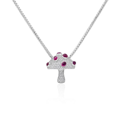white gold mushroom-shaped pendant with red gemstones
